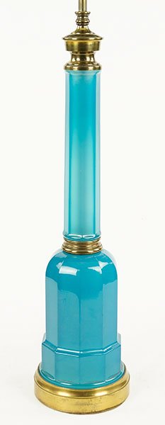 A Blue Opaline Glass Lamp.: A Blue Opaline Glass Lamp. Bearing a bow form finial Total Height 42"
