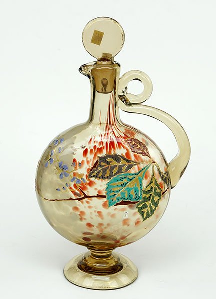 A Moser Enameled Glass Bottle.: A Moser Enameled Glass Bottle. Amber and red mottled glass bottle bears applied enamel and gilt decoration. Signed Height: 12"