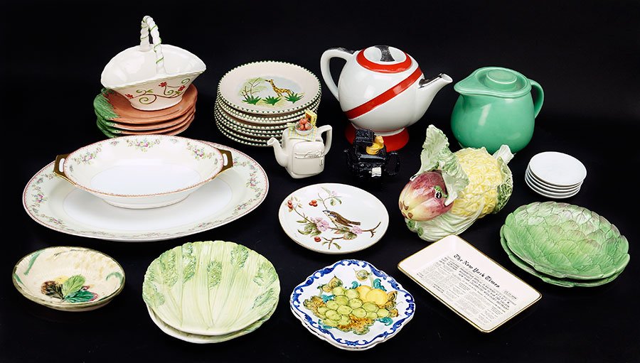 A Group Of Four Teapots.: A Group Of Four Teapots. Together with a ceramic rabbit form cookie jar, eight Italian ceramic vegetable form plates, eighteeen porcelain plates in various sizes, a porcelain basket, and other Tallest