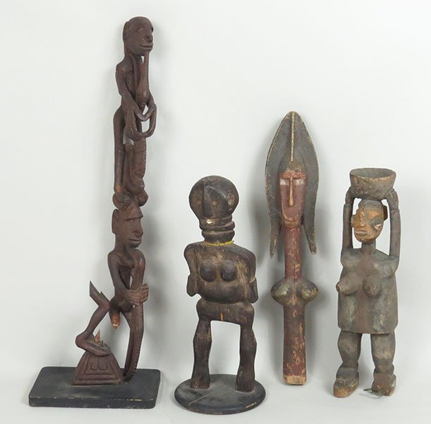 A Collection of Wood Carved African Figures and: A Collection of Wood Carved African Figures and Sculptures. Consisting on a totem, carved women figures and a double sided carved woman portrait Totem: 38.5"