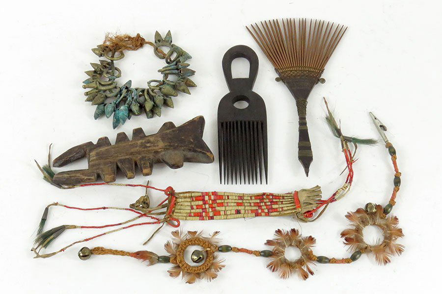 A Collection of African Jewelry.: A Collection of African Jewelry. An anklet, necklace, combs and arm band, together with a piece of carved wood
