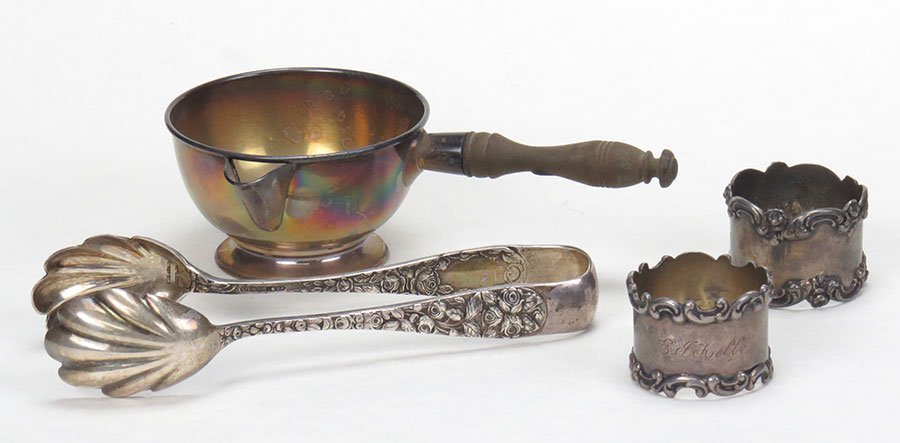 Two Sterling Silver Napkin Rings.: Two Sterling Silver Napkin Rings. Together with a sterling silver and wood sauce boat, and a pair of sterling silver ice tongs