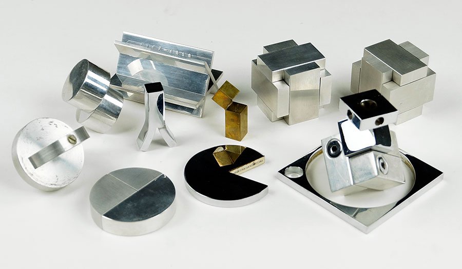 A Group of Paul Mayen Stainless Steel Decorative: A Group of Paul Mayen Stainless Steel Decorative Objects. Largest: 3" x 2"