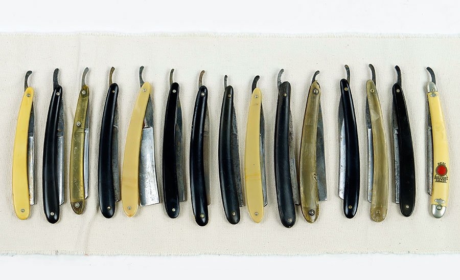 A Collection Of Straight Razors.: A Collection Of Straight Razors. Comprising fifteen straight razors including those by Dubl Duck, Kanan Bros, Wade & Butcher, and others
