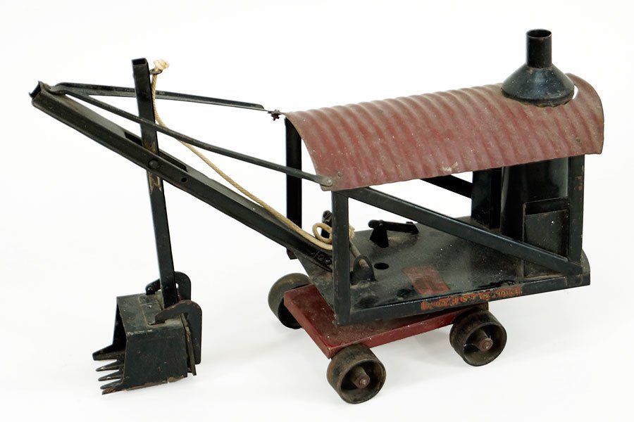 1930's Buddy L Steam Shovel.: 1930's Buddy L Steam Shovel. Pressed steel, with the original labels 20" x 7" x 13"
