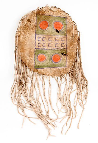 A 20th Century Native American Hide Shield.: A 20th Century Native American Hide Shield. Depicting horse tracks and red circles, made of hide. From the Native American collection of Ralph Edward Guy who was listed in Who's Who in American Indian