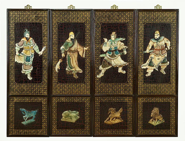 A Set of Four Warrior Panels.: A Set of Four Warrior Panels. Bearing applied painted soapstone decoration Panel frame: 36" x 12"