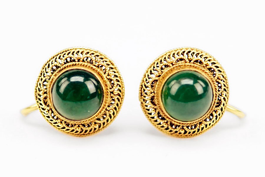 A Pair of Green Onyx and 14 Karat Yellow Gold Screwback: A Pair of Green Onyx and 14 Karat Yellow Gold Screwback Earrings. Wirework screwback earrings each contain one round cabochon green onyx Wt: 4.2 grams