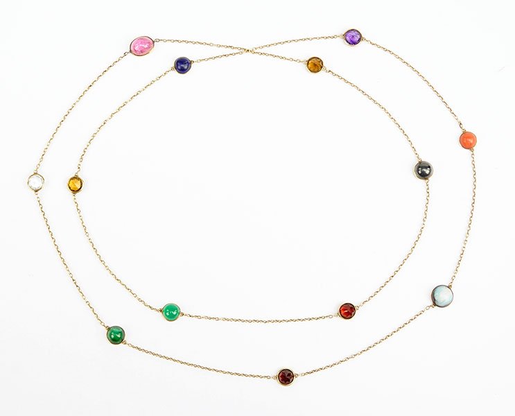 A 14 Karat Yellow Gold And Multi-Stone Necklace.: A 14 Karat Yellow Gold And Multi-Stone Necklace. Comprising rock crystal, pink tourmaline, green onyx, garnet, black opal, coral, amethyst, lapis, citrine, malachite, hematite, and madeira citrine Len