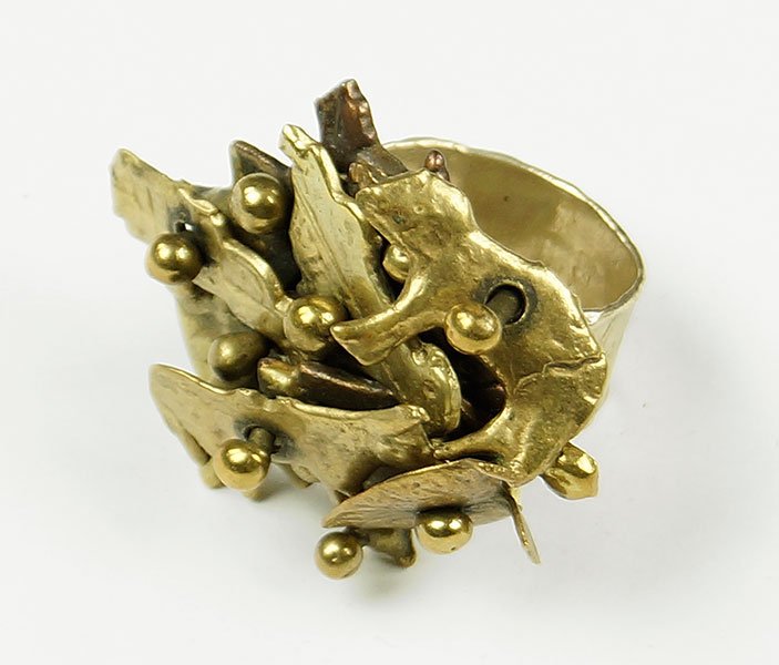 A Pal Kepenyes Mixed Metal Ring.: A Pal Kepenyes Mixed Metal Ring. Comprising articulated animal, car, and heart forms. Signed on underside Size: 6