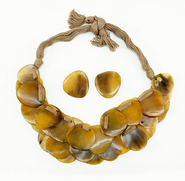 A Gerda Lynggaard Monies Horn Demi-Parure.: A Gerda Lynggaard Monies Horn Demi-Parure. Comprising a necklace and pair of earclips. Horn segments on both layers of necklace are attached with nude color silk cords Necklace Length: 26"