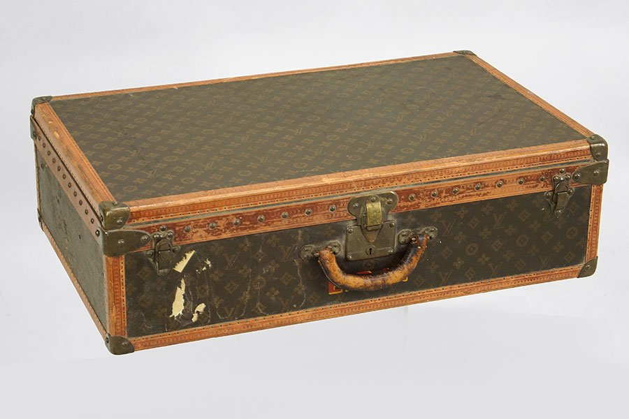 A Louis Vuitton 'Alzer' Suitcase.: A Louis Vuitton 'Alzer' Suitcase. Monogrammed canvas and leather hardsided suitcase. Interior bears a serial number of 802579 , dating from 1933. Provenance: Mrs. Henry J. Heinz II, Sharpsburg, Pennsy