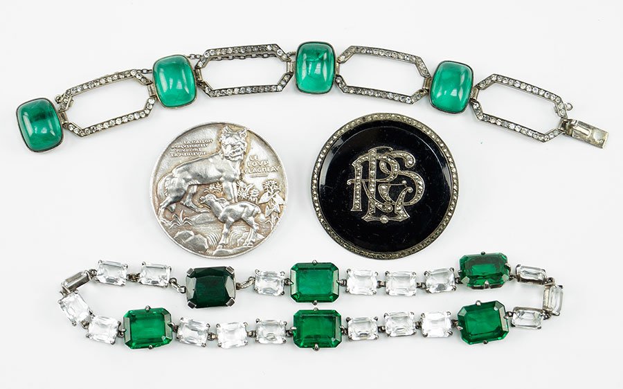 A Continental Glass Paste and Rhinestone Bracelet.: A Continental Glass Paste and Rhinestone Bracelet. Containing four cabochon faux emeralds with rhinestone links between. Together with a faux emerald and rhinestone necklace, an onyx and marcasite bro