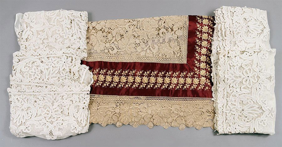 An Embroidered Silk and Lace Square Table Cloth.: An Embroidered Silk and Lace Square Table Cloth. Together with a suite of four lace panels. Approximate measurements: Table cloth - 7' x 7' Each panel - 9'10" x 2'9"