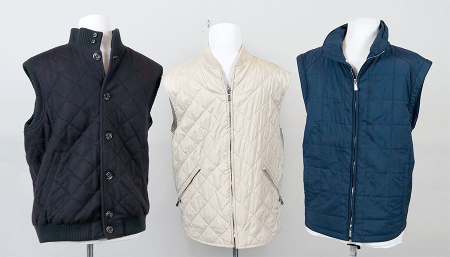 Three Loro Piana Men's Vests.: Three Loro Piana Men's Vests. Comprising a brown cashmere quilted vest, a navy cotton/polyester blend quilted vest, and an ivory polyester quilted vest Each Size: Medium