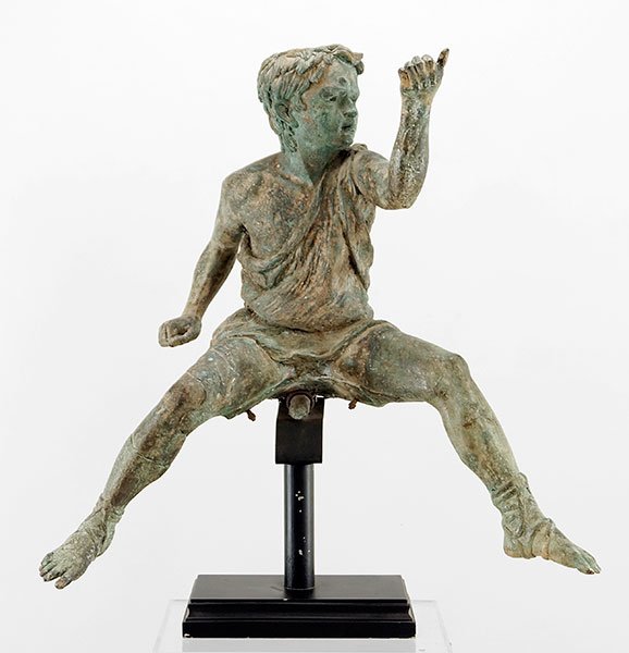 A Patinated Brass Figure of a Child. (1 of 2)