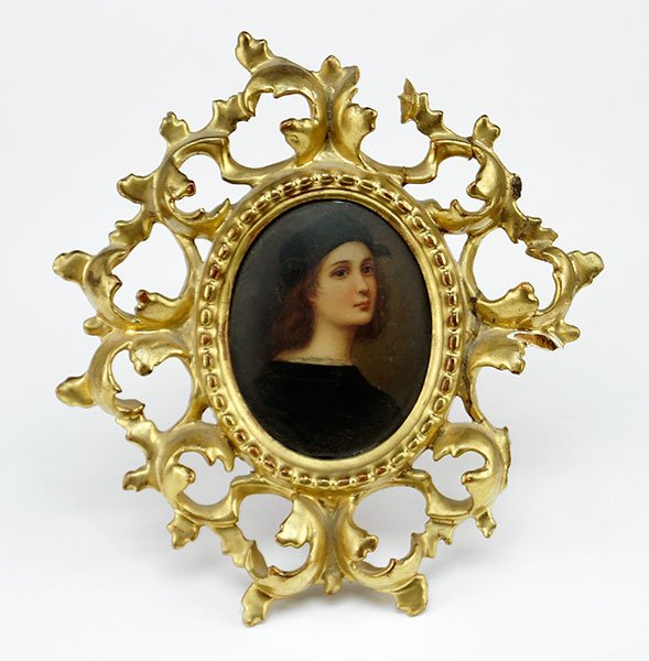 A Framed Italian Portrait on Porcelain.: A Framed Italian Portrait on Porcelain. Depicting the young Raphael in a gilt wood frame Plaque: 3.5" x 2.75"
