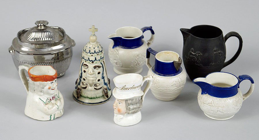 An English Creamware Stirrup Cup. (1 of 1)