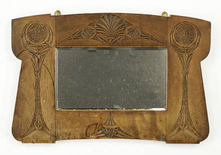 A French Carved Wood Mirror.: A French Carved Wood Mirror. Art Nouveau style mirror with geometric decoration throughout 16" x 25"