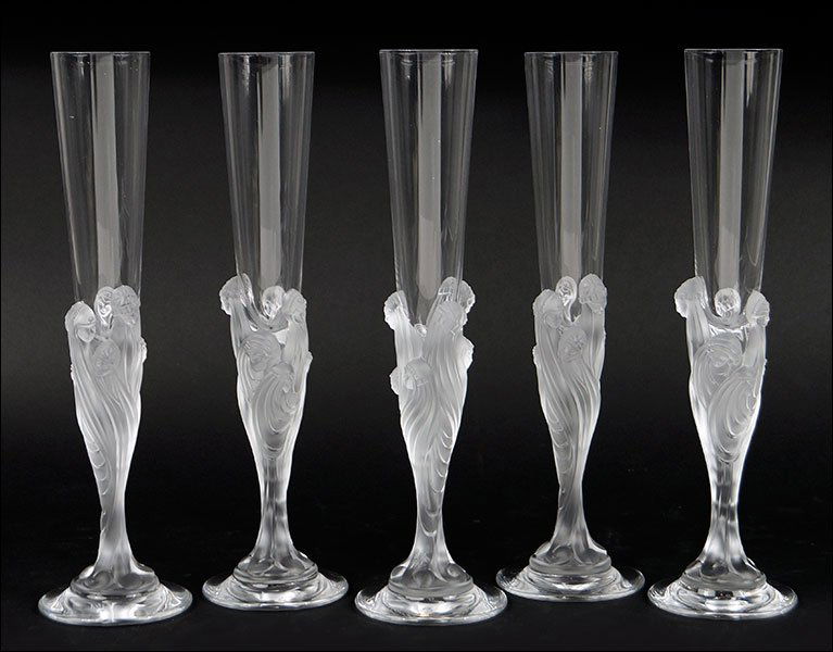 A Set of Eleven Erte Frosted and Clear Crystal: A Set of Eleven Erte Frosted and Clear Crystal Champagne Flutes. "Majestic" flutes bear etched signature underneath "Erte Made in France". Also signed at the base of the flute. With original boxes Hei