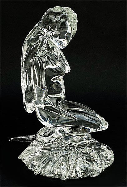 A Clear Glass Figure of a Mermaid.: A Clear Glass Figure of a Mermaid. Underside is signed, titled, and dated "Solstice, CMOG, '00", for Corning Museum of Glass Height: 9"