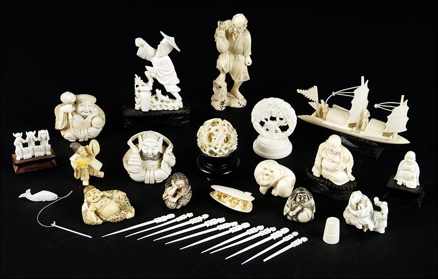 A Collection of Chinese Carved Decorative Items.: A Collection of Chinese Carved Decorative Items. Comprising bone figural netsukes, fishermen, a puzzle ball, and others Tallest figure: 4.75"