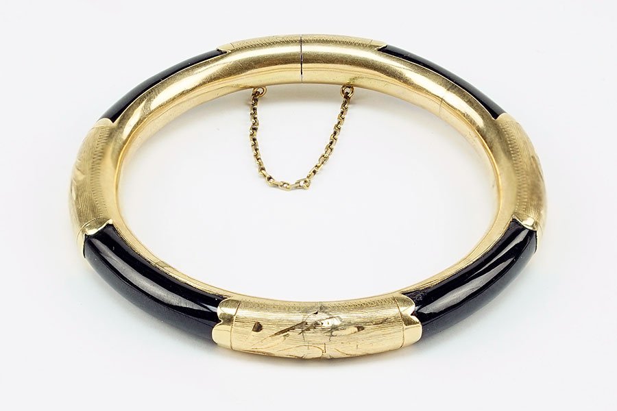 An Onyx and 14 Karat Yellow Gold Bangle Bracelet. (1 of 1)