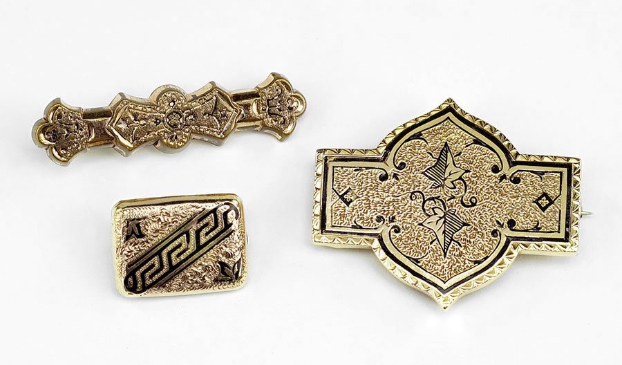 A 14 Karat Yellow Gold And Black Enamel Brooch. (1 of 1)