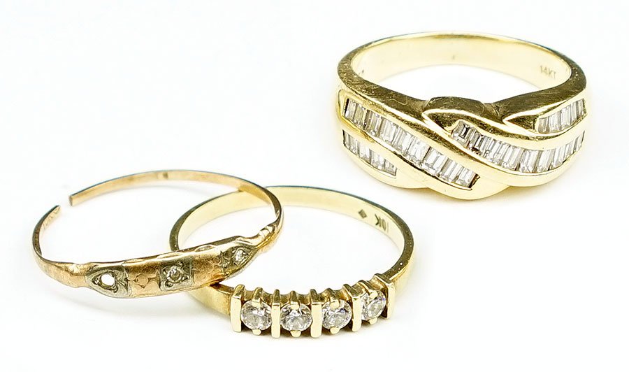 A Diamond and 14 Karat Yellow Gold Ring. (1 of 1)