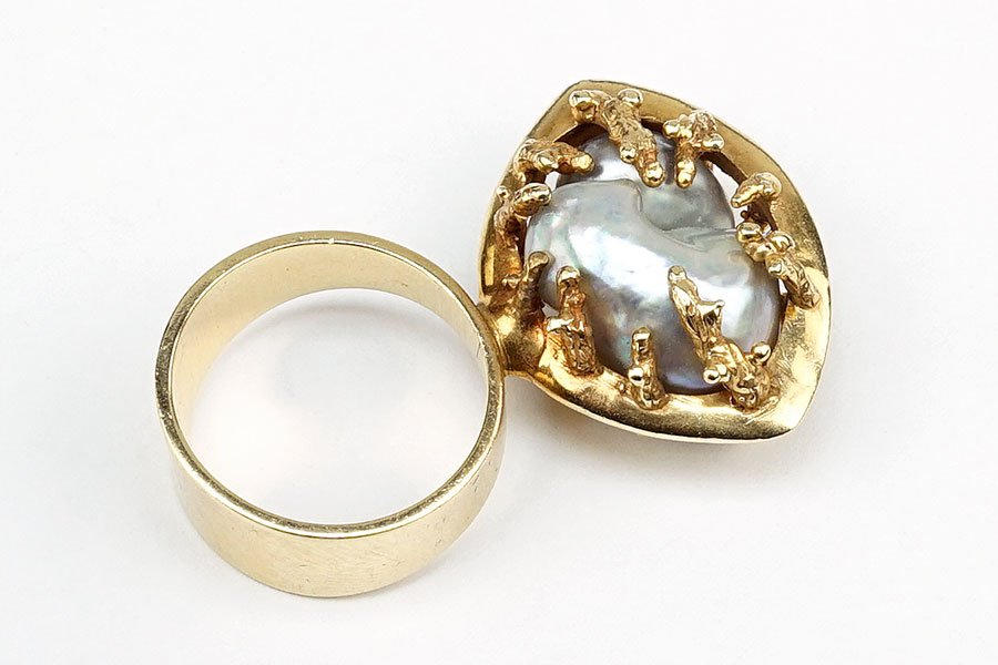 A Grey Baroque Pearl and 14 Karat Yellow Gold Ring. (1 of 2)