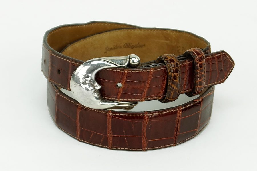 A Kieselstein Cord Sterling Silver Moon Belt Buckle.: A Kieselstein Cord Sterling Silver Moon Belt Buckle. Together with an alligator belt (length: 34") Buckle: 1.5" x 2"