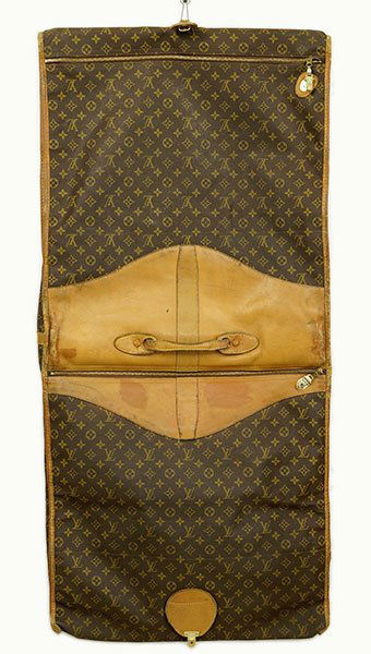 A Louis Vuitton Monogrammed Canvas Garment Bag. (1 of 1)