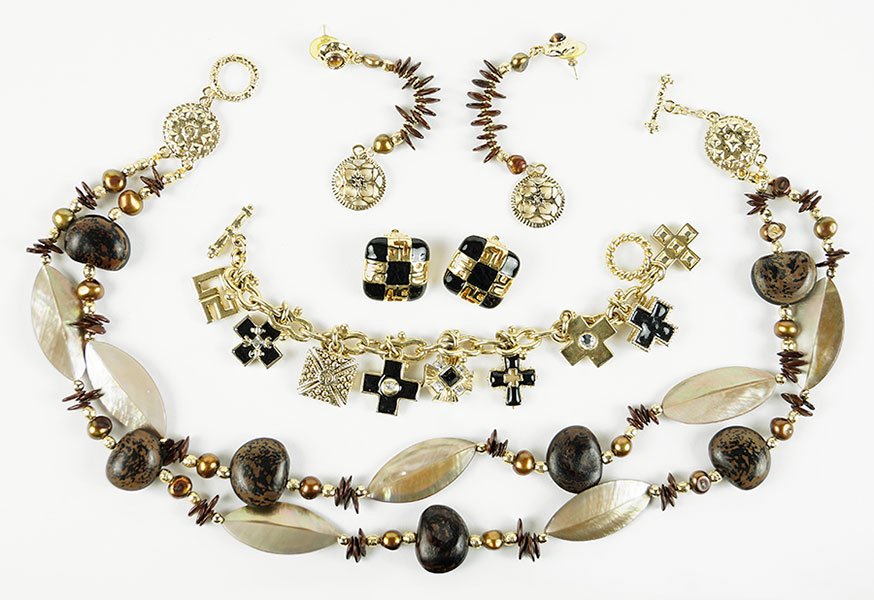 A St. John Wood Bead, Mother-Of-Pearl, And Goldtone: A St. John Wood Bead, Mother-Of-Pearl, And Goldtone Necklace. Together with a coordinating pair of postback earrings, a St. John goldtone, black enamel, and white rhinestone cross charm bracelet, and 
