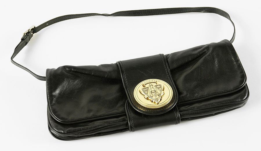 A Gucci Black Leather Shoulder Bag. (1 of 2)