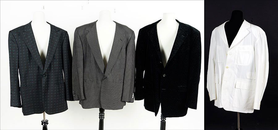 A Gianni Versace Black Velvet Men's Jacket.: A Gianni Versace Black Velvet Men's Jacket. Together with a Gianni Versace polka dot jacket, a Brioni white cotton jacket, and a Brioni black jacket depicting music notes Approximate Size Of Each: 42
