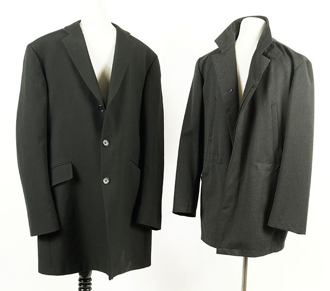 A Brioni Men's Black Car Coat.: A Brioni Men's Black Car Coat. With removable zip out vest liner (Approximate Size: M). Together with a John Varvatos wool blend black jacket (Size: 54 EUR)