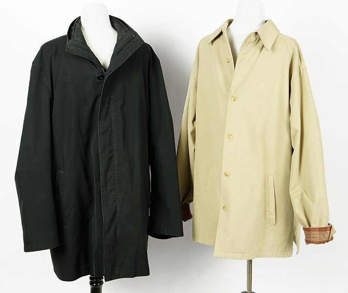 A Luciano Barbera Men's Tan Cotton Car Coat.: A Luciano Barbera Men's Tan Cotton Car Coat. Bearing plaid cuffs (Size: 52 EUR). Together with a Sanyo black car coat bearing removable zip out vest liner (Size: L)