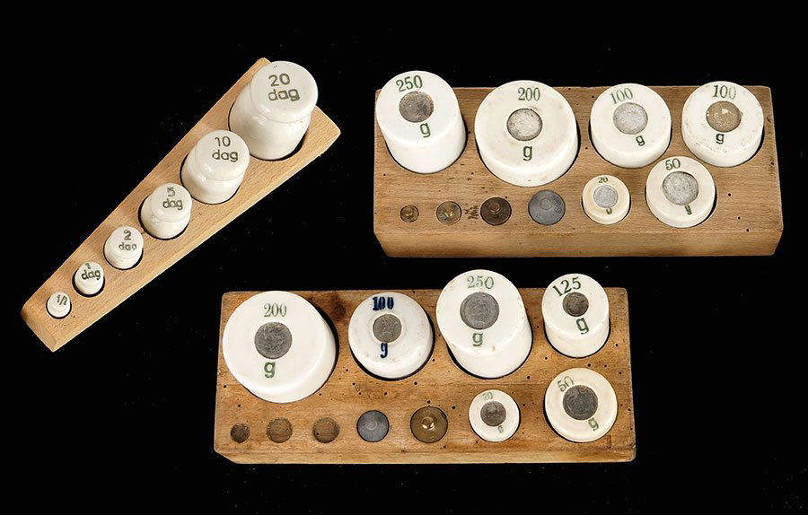 A Porcelain Ceramic Dekagrams Weight Set. (1 of 1)