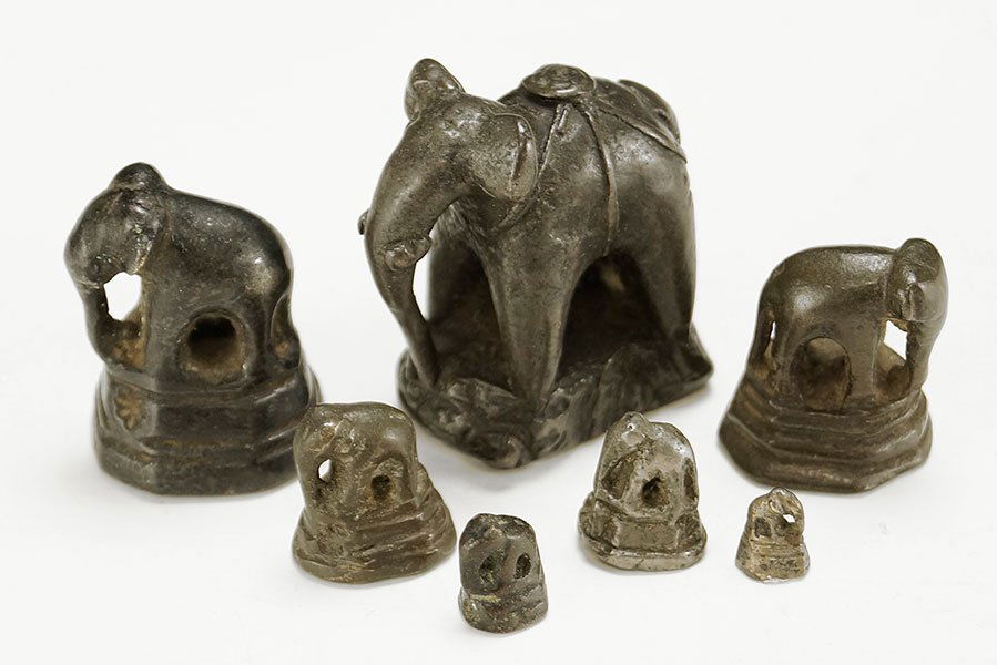 A Collection of Seven Figural Elephant Opium Weights. (1 of 1)