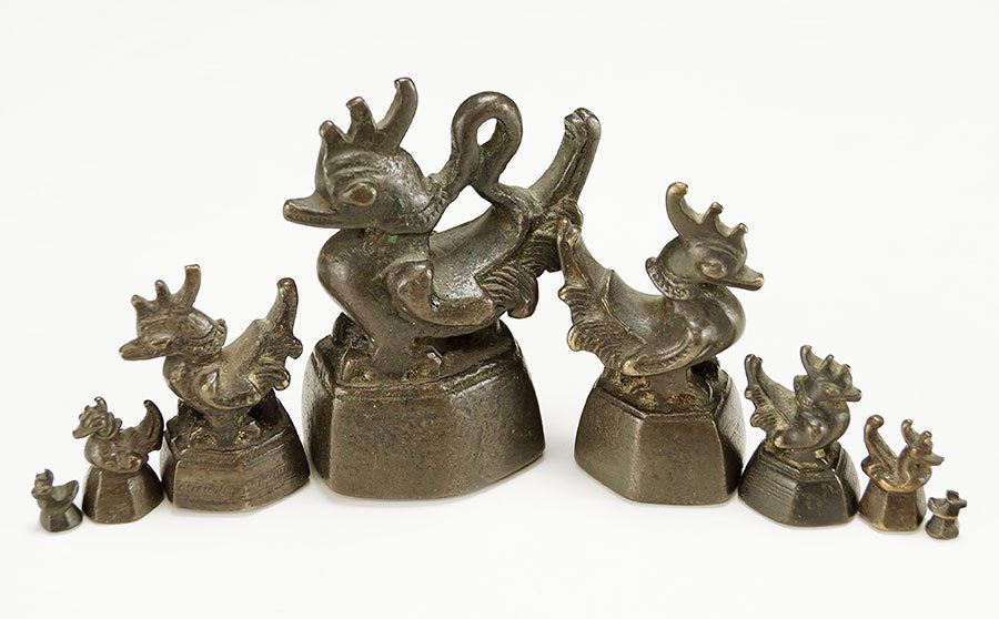 A Set of Eight Figural Bird Form Opium Weights. (1 of 1)