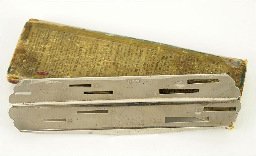 An 1877 Thompson Counterfeit Coin Detector. (1 of 7)