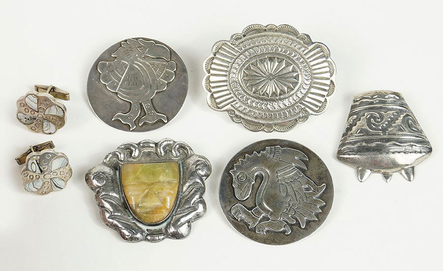 A P. Ochoa Mexican Sterling Silver And Onyx Brooch.: A P. Ochoa Mexican Sterling Silver And Onyx Brooch. Together with four additional Mexican silver brooches and a pair of silver and mother-of-pearl flower form earrings Onyx Brooch: 2.25"