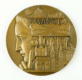 Pierre Turin (French, 1891-1968) France.: Pierre Turin (French, 1891-1968) France. Patinated bronze medal. Signed "P. Turin" along one side. Depicting a "face of France" amidst monuments on one side, and a map of France with monuments through