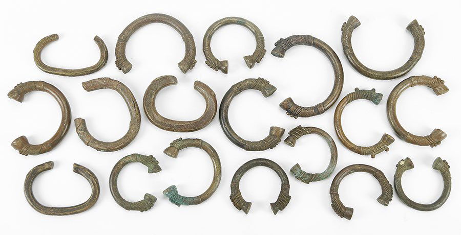 A Collection Of African Metal Currency Bracelets. (1 of 2)