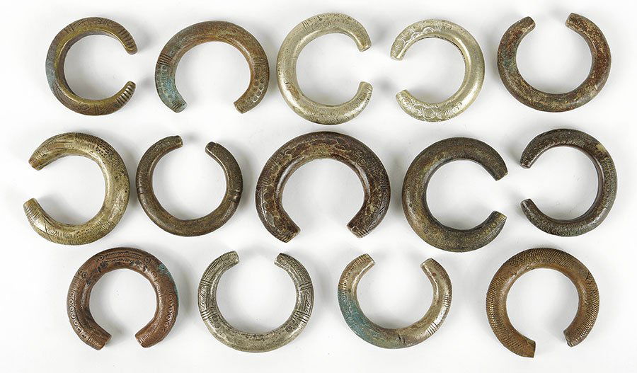 A Collection Of African Metal Currency Bracelets. (1 of 2)