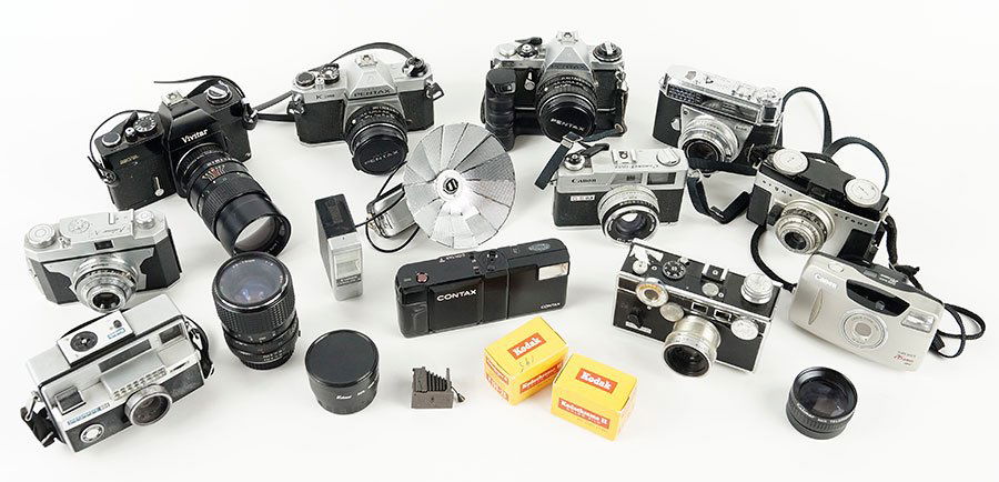 A Collection Of 35mm Cameras And Lenses. (1 of 1)