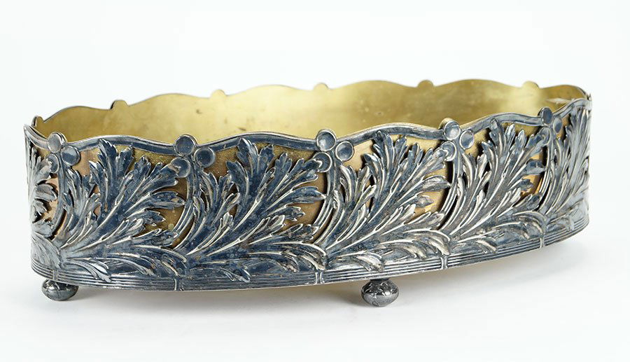 An Arthur Krupp for Berndorfer, Centerpiece.: An Arthur Krupp for Berndorfer, Centerpiece. Oval filigree silverplate centerpiece with decoration in the form of leaves and berries. Removabe brass liner can be seen through the openwork of the outer
