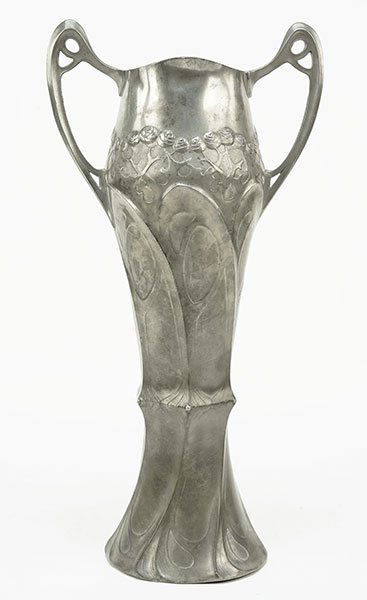 Attributed to Friedrich Adler (German, 1878-1942) A: Attributed to Friedrich Adler (German, 1878-1942) A Juventa Vase. Pewter vase with organic decoration throughout the body and two handles 16" x 8"