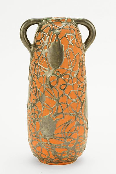 Felix Gete (French, Early 20th Century) A Vase.: Felix Gete (French, Early 20th Century) A Vase. Hand built pottery vase with double handles bears a "gun metal" colored drippy glaze throughout the body, with a slight green glaze beneath. Handles are