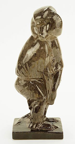 A French Glazed Ceramic Figure of a Baboon. (1 of 2)